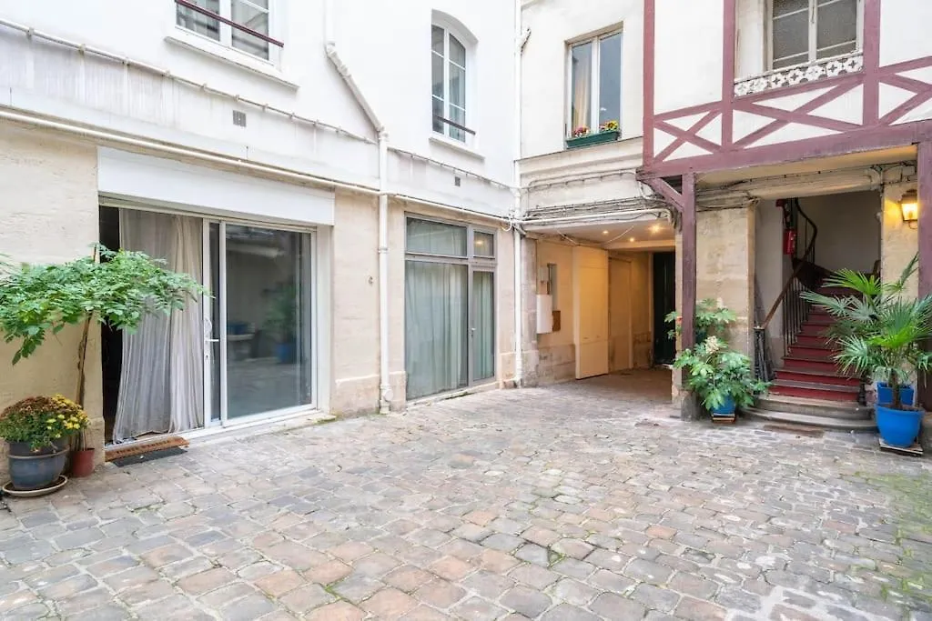 Апартаменты Grand Duplex Montmartre Париж